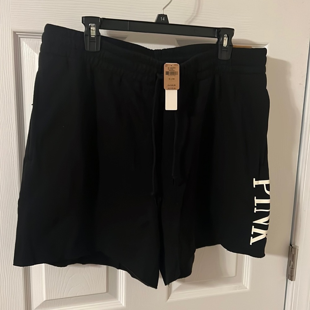 Victoria Secret black fleece sweat shorts.  New with tags.  XL